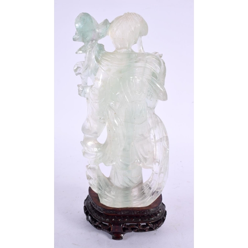 2265 - AN UNUSUAL 19TH CENTURY CHINESE CLEAR GREEN QUARTZ FIGURE OF A FEMALE Qing. 18 cm x 7 cm.