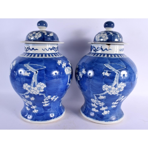 2281 - A LARGE PAIR OF 19TH CENTURY CHINESE BLUE AND WHITE PORCELAIN VASES AND COVERS Kangxi style. 32 cm x... 