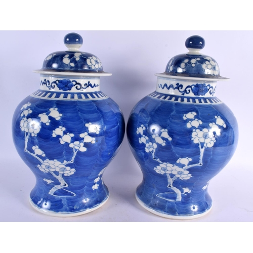 2281 - A LARGE PAIR OF 19TH CENTURY CHINESE BLUE AND WHITE PORCELAIN VASES AND COVERS Kangxi style. 32 cm x... 