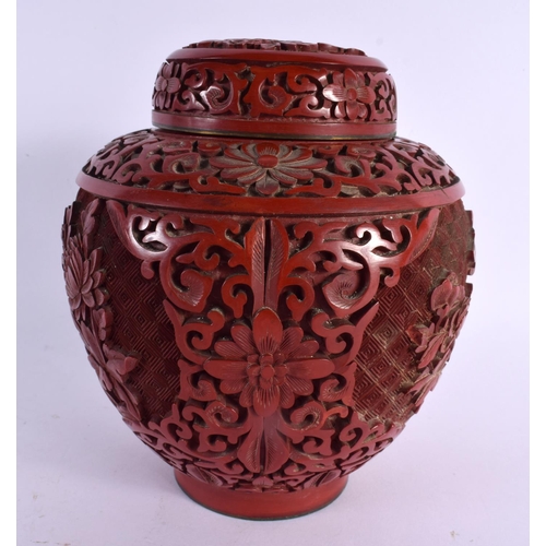 2288 - A 19TH CENTURY CHINESE CARVED CINNABAR LACQUER GINGER JAR AND COVER decorated with foliage. 15 cm x ... 