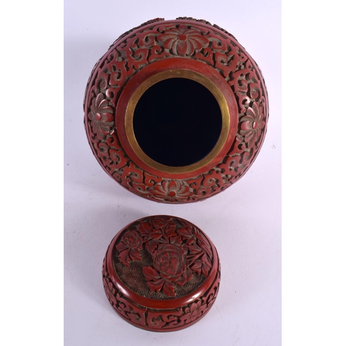 2288 - A 19TH CENTURY CHINESE CARVED CINNABAR LACQUER GINGER JAR AND COVER decorated with foliage. 15 cm x ... 