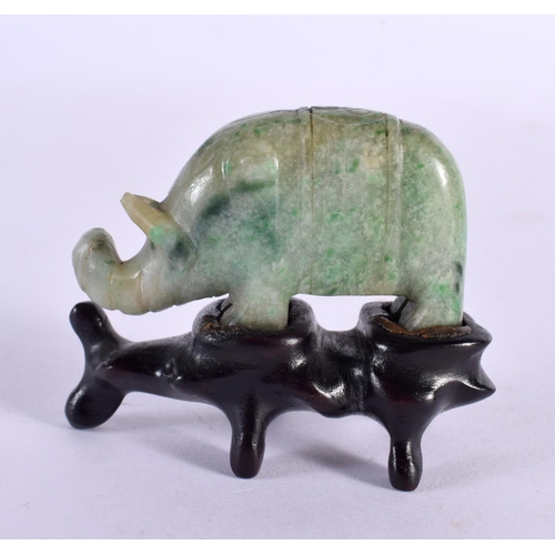 2289 - AN EARLY 20TH CENTURY CHINESE CARVED JADEITE FIGURE OF AN ELEPHANT Late Qing/Republic. 5 cm x 5 cm.