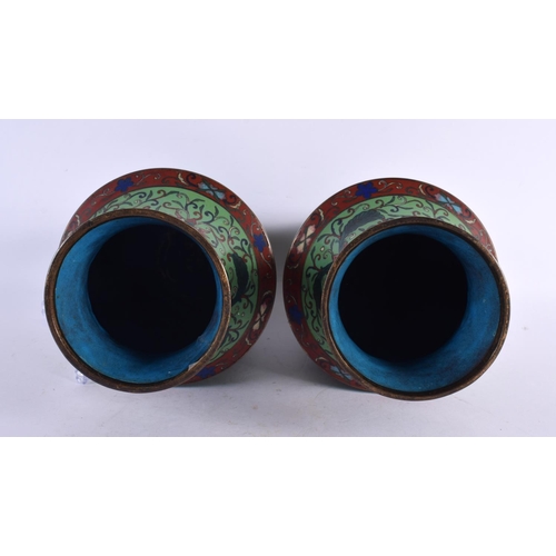 2304 - A PAIR OF 19TH CENTURY CHINESE CLOISONNE ENAMEL VASES decorated with foliage. 25 cm x 10 cm.