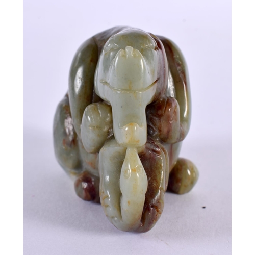 2326 - A CHINESE CARVED MUTTON JADE BEAST 20th Century. 7.25 cm x 5.5 cm.