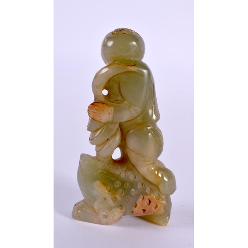 2327 - A CHINESE CARVED GREEN JADE FIGURE 20th Century. 8 cm x 4 cm.