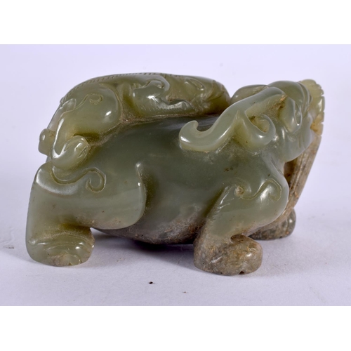 2328 - A CHINESE CARVED GREEN JADE BEAST 20th Century. 7 cm x 4 cm.