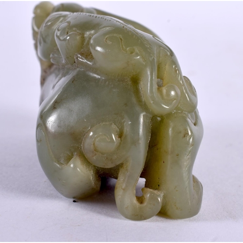 2328 - A CHINESE CARVED GREEN JADE BEAST 20th Century. 7 cm x 4 cm.