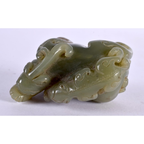 2328 - A CHINESE CARVED GREEN JADE BEAST 20th Century. 7 cm x 4 cm.