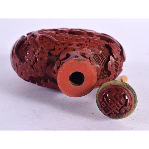 2332 - A 19TH CENTURY CHINESE CARVED CINNABAR LACQUER SNUFF BOTTLE AND STOPPER Qing. 8.25 cm x 6.5 cm.