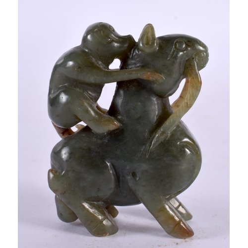 2345 - A CHINESE CARVED GREEN JADE BEAST 20th Century. 7 cm x 5.25 cm.