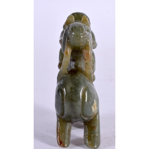 2345 - A CHINESE CARVED GREEN JADE BEAST 20th Century. 7 cm x 5.25 cm.