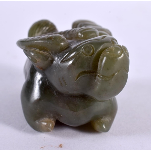 2346 - A CHINESE CARVED GREEN JADE BEAST 20th Century. 7 cm x 3.75 cm.