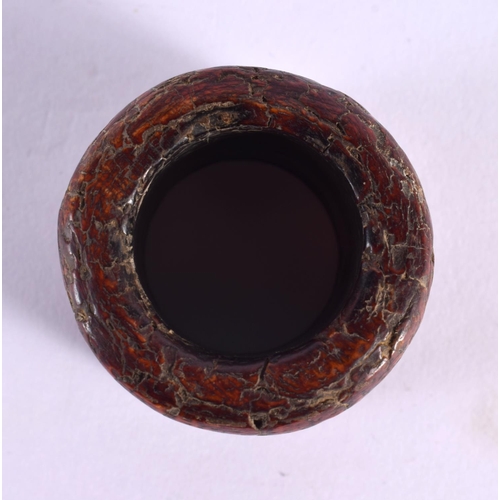 2357 - A CHINESE CARVED HORN ARCHERS RING 20th Century. Z. 4 cm x 3 cm.