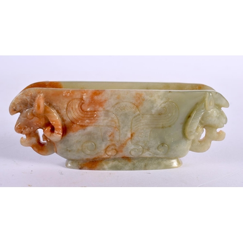 2358 - A CHINESE CARVED JADE LIBATION CUP 20th Century. 10.5 cm x 2.25 cm.