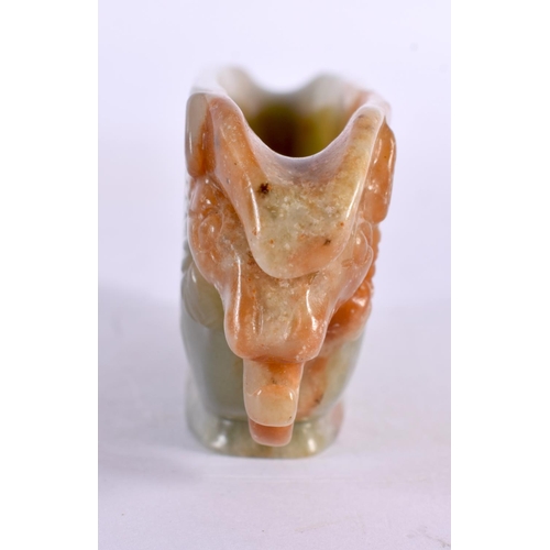 2358 - A CHINESE CARVED JADE LIBATION CUP 20th Century. 10.5 cm x 2.25 cm.