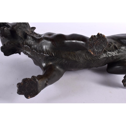 2371 - A LARGE 19TH CENTURY JAPANESE MEIJI PERIOD BRONZE OKIMONO modelled as a roaming tiger, with glass ey... 