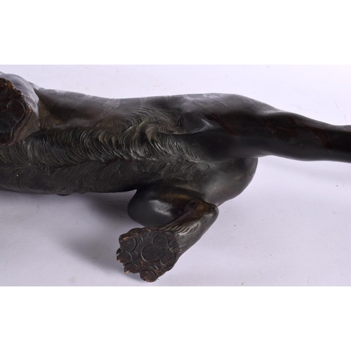 2371 - A LARGE 19TH CENTURY JAPANESE MEIJI PERIOD BRONZE OKIMONO modelled as a roaming tiger, with glass ey... 