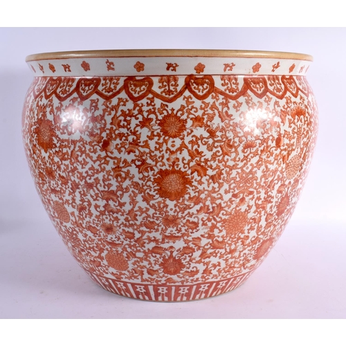 2372 - A LARGE CHINESE REPUBLICAN PERIOD IRON RED PORCELAIN PLANTER painted with flowers. 42 cm x 40 cm.