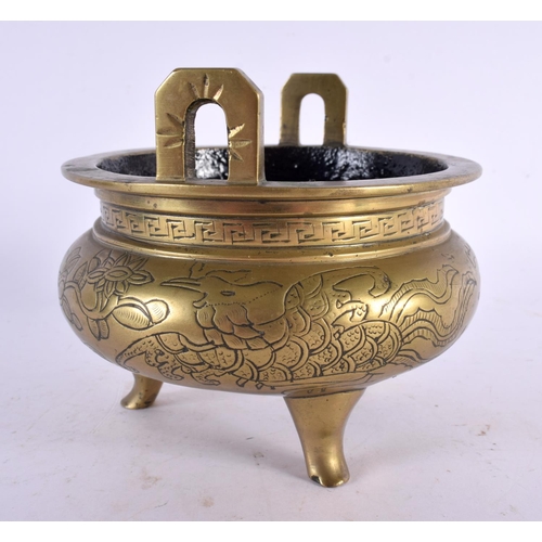 2384 - A 19TH CENTURY CHINESE TWIN HANDLED BRONZE CENSER bearing Xuande marks to base. 11 cm wide, internal... 