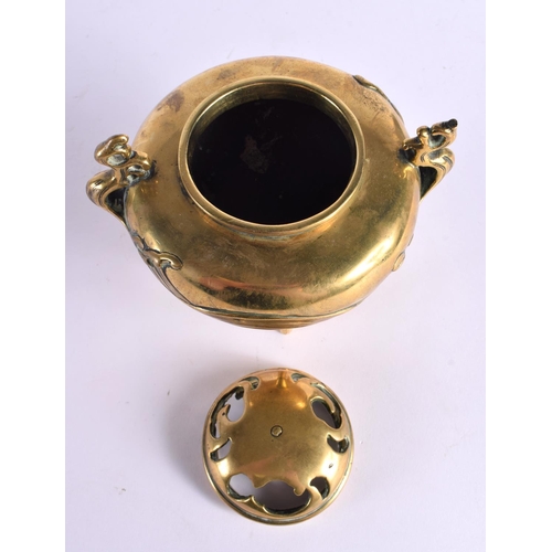 2386 - A 19TH CENTURY JAPANESE MEIJI PERIOD BRONZE CENSER AND COVER decorated with waves. 15 cm x 12 cm.