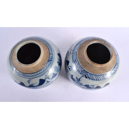 2393 - A PAIR OF 18TH CENTURY CHINESE BLUE AND WHITE PROVINCIAL POTTERY GINGER JARS Qing. 17 cm x 13 cm.