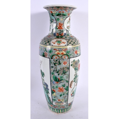 2404 - A 19TH CENTURY CHINESE FAMILLE VERTE PORCELAIN VASE bearing Kangxi marks to base. 30 cm high.