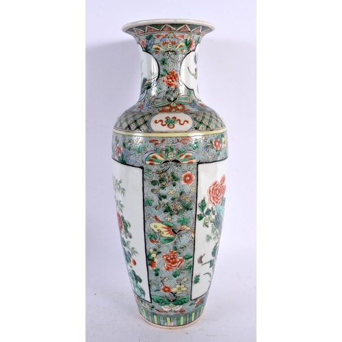 2404 - A 19TH CENTURY CHINESE FAMILLE VERTE PORCELAIN VASE bearing Kangxi marks to base. 30 cm high.