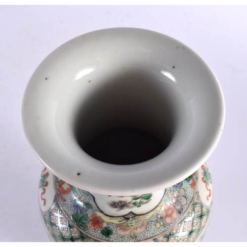 2404 - A 19TH CENTURY CHINESE FAMILLE VERTE PORCELAIN VASE bearing Kangxi marks to base. 30 cm high.