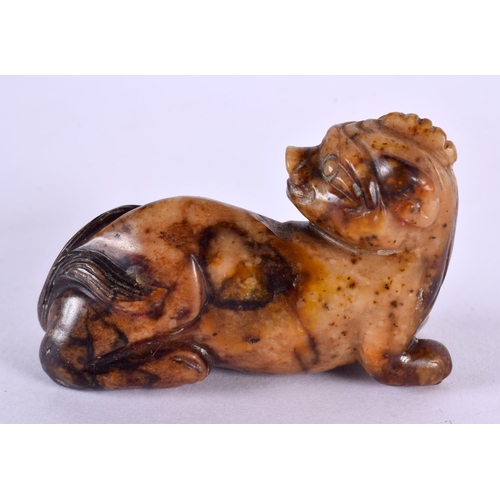 2427 - A CHINESE QING DYNASTY CARVED RUSSET JADE FIGURE OF A BEAST. 6.5 cm x 3 cm.