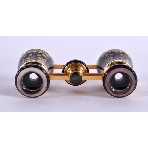 487 - A CASED  PAIR OF ANTIQUE GILT AND DARK ABALONE SHELL OPERA GLASSES.  6.5cm (closed) 4.7cm (extended)... 