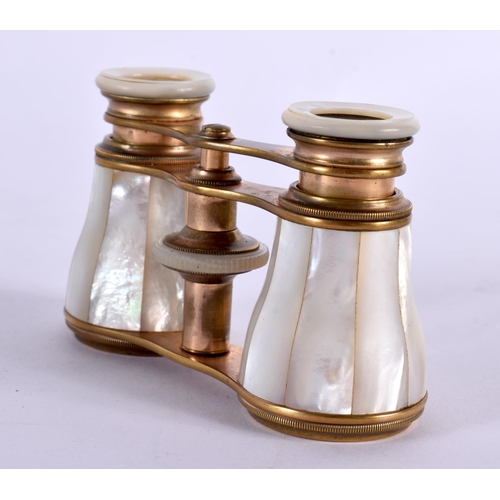 489 - A CASED PAIR OF ANTIQUE BUSCH MOTHER OF PEARL OPERA GLASSES.  5.9cm (closed) 7.2cm (extended) x 9.9c... 