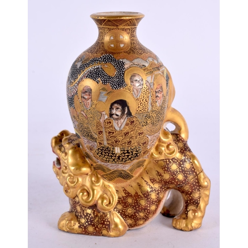 2013 - A 19TH CENTURY JAPANESE MEIJI PERIOD SATSUMA VASE formed as a buddhistic lion, painted with immortal... 