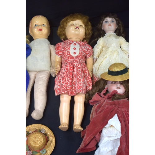 A collection of antique dolls, parts, clothing, hair pieces, etc. (Qty)