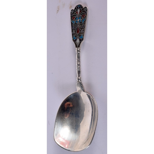 104 - AN ANTIQUE RUSSIAN SILVER AND ENAMEL CADDY SPOON. 36 grams. 12 cm long.