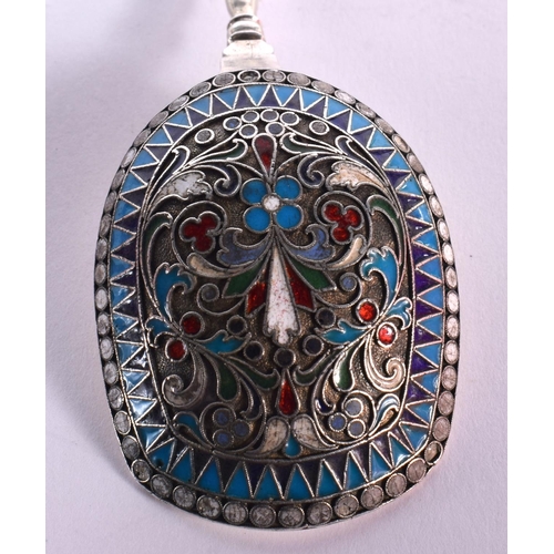 104 - AN ANTIQUE RUSSIAN SILVER AND ENAMEL CADDY SPOON. 36 grams. 12 cm long.