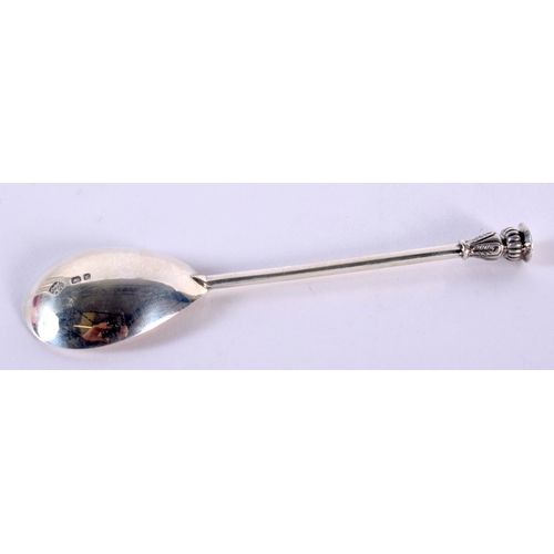 106 - A GUILD OF HANDICRAFTS SILVER SPOON. 28 grams. 13 cm long.