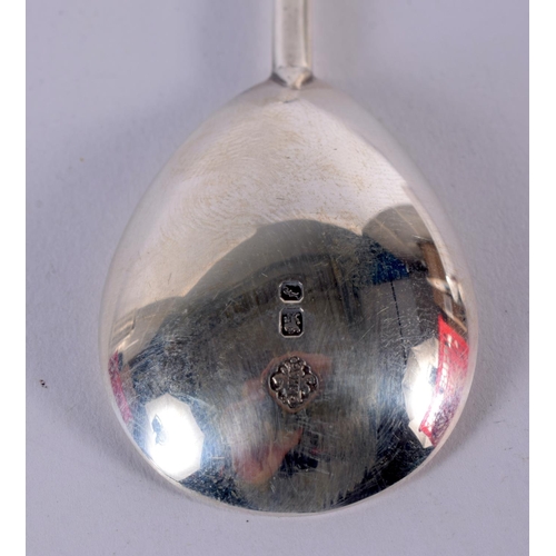 106 - A GUILD OF HANDICRAFTS SILVER SPOON. 28 grams. 13 cm long.