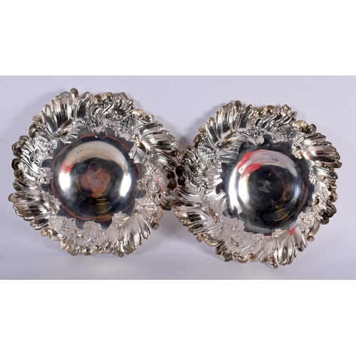 110 - A PAIR OF VICTORIAN SILVER FRUIT DISHES by Walker & Hall. Sheffield 1895. 1236 grams. 28 cm x 8 cm.