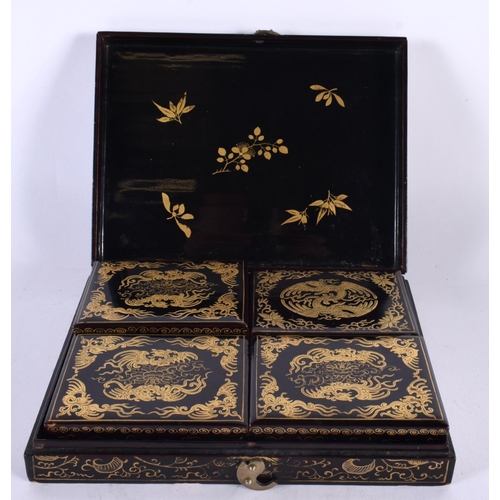 117 - A 19TH CENTURY CHINESE BLACK LACQUER COUNTRY HOUSE SQUARE FORM BOX Qing, painted with opposing phoen... 