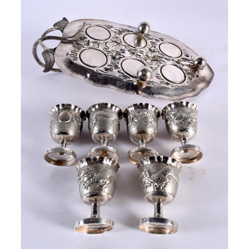 118 - AN UNUSUAL SET OF LATE 19TH CENTURY CHINESE EXPORT SILVER CUPS ON STAND by Luen Wo, decorated with d... 