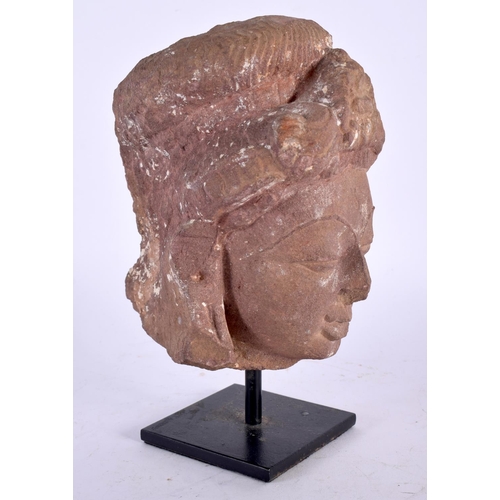 12 - A 7th/8th Century Pink Sandstone Head of a Female Deity, Madhya Pradesh, Central India mounted on a ... 