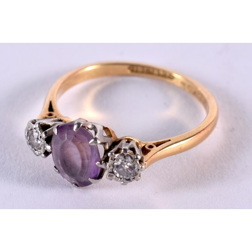 129 - 18ct Gold Amethyst And Diamond Set Trilogy Ring. Q. 3.6 grams.