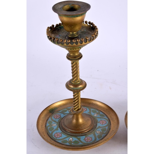 15 - A PAIR OF 19TH CENTURY FRENCH BRONZE AND CHAMPLEVE ENAMEL CANDLESTICKS with spiral formed central st... 