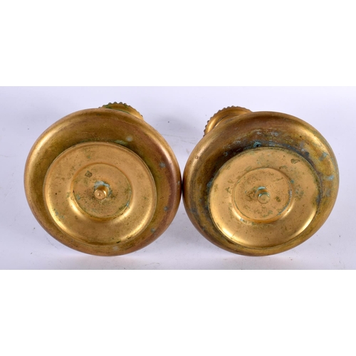 15 - A PAIR OF 19TH CENTURY FRENCH BRONZE AND CHAMPLEVE ENAMEL CANDLESTICKS with spiral formed central st... 