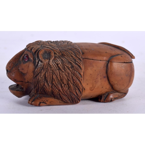 17 - AN 18TH CENTURY FRENCH DUTCH FRUITWOOD CARVED WOOD SNUFF BOX modelled in the form of a recumbent lio... 