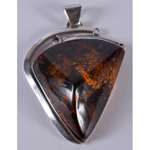 174 - Three Statement Silver Baltic Amber Pendants. 65 grams. Largest 8.75 cm x 3.75 cm. (3)