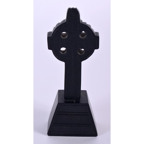 33 - AN IRISH BOG OAK KILLARNEY CROSS decorated all over with shamrock. 59.2 grams. 12 cm x 6 cm. Note: B... 