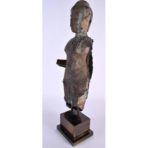 37 - A Very Rare 13th/14th Century Standing Bronze Buddha, Thailand, Sukotham from the collection of C. R... 