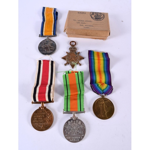 445 - A WWI MEDAL GROUP together with defence medals etc, presented to 2425 Pte  G Storey Camb R. (qty)