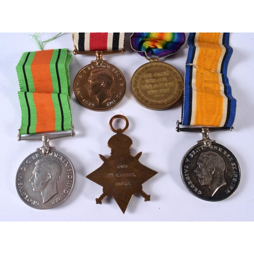 445 - A WWI MEDAL GROUP together with defence medals etc, presented to 2425 Pte  G Storey Camb R. (qty)